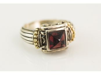 (D15) STERLING SILVER RING W/18KT GOLD ACCENT AND RED GARNET-BY FRED-SIZE 9-6 DWT