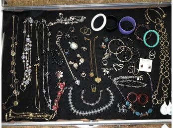 (J-7) LOT OF VINTAGE COSTUME JEWELRY - APPROX. 50 PIECES - PURPLE BANGLE, FLOWER BRACELET, SILVER CHAINS