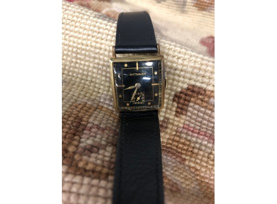WITTNAUER 14K GOLD MEN'S WATCH WITH BLACK FACE & BLACK LEATHER BAND - 1.25'