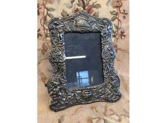 ANTIQUE - 5X7 STERLING SILVER PICTURE FRAME WITH CHERUBS. MONOGRAMMED ON TOP