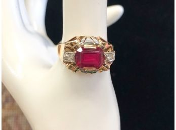 14 KARAT-RUBY AND CZ LADIES RING. SIZE 6.3 AND WEIGHS APPROX. 3 DWT