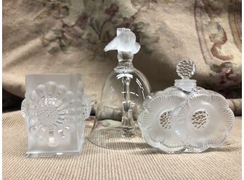 LOT OF THREE (3) SIGNED LALIQUE PIECES - SUNFLOWER VASE - PEONE PERFUME BOTTLE WSTOPPER & BIRD BELL -