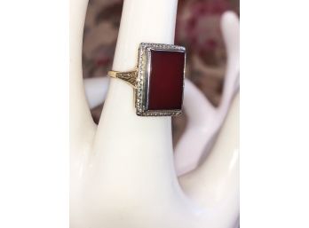 14 KARAT WHITE GOLD CARNELIAN RING. SIZE 4.5 AND WEIGHS APPROX. 2.75 DWT