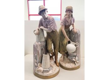 PAIR OF 24 INCH TALL ROYAL DUX 24 INCH TALL PORCELAIN STATUE , MAN AND WOMAN AT WELL.