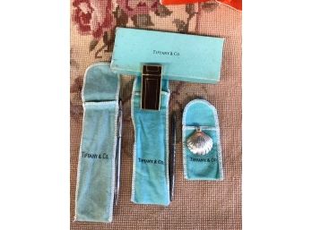 LOT OF 4 TIFFANY PIECES: 2 STERLING SILVER PENS, 1 SHELL PERFUME AND CIGARETTE LIGHTER (NOT STERLING)