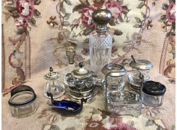 LOT OF 10 PIECES OF STERLING AND GLASS. SALTS AND PERFUMES