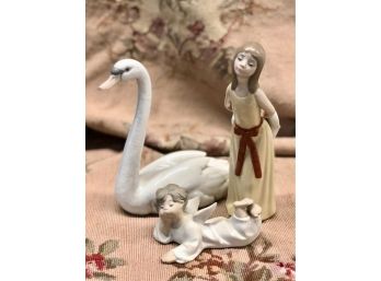 LOT OF THREE LLADRO FIGURINES - SWAN - GIRL WITH HAT & BABY ANGEL