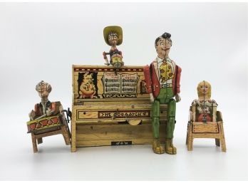 A-13- 1945 LIL' ABNER 'DOGPATCH 4' BAND WIND UP TIN TOY - COMPLETE, PARTIALLY WORKING, W/KEY -11' BY 9'