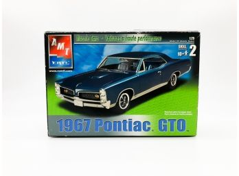 (C99) VINTAGE PLASTIC CAR MODEL-1967 PONTIAC GTO-BY AMT-PARTS STILL IN PLASTIC & ORIG. BOX