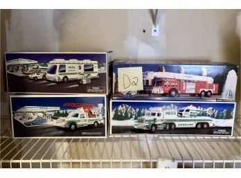 LOT OF 4 VINTAGE HESS AND SUNOCO TRUCKS- D2