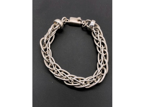 (68) STERLING SILVER INTERTWINED BRACELET - MEXICO - 26.4 DWT - APPROX.8 1/2'