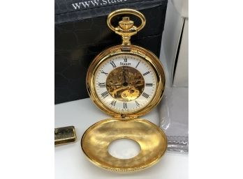 (49) STAUER GOLD TONED POCKET WATCH WITH CHAIN AND FOB - NIB - NEVER USED - CASE IS DAMAGED
