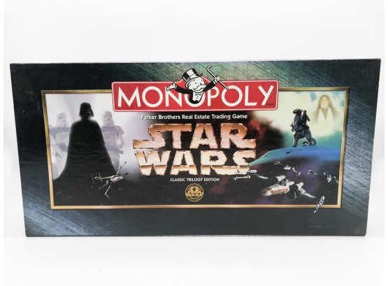 (51) Star Wars MONOPOLY GAME - CLASSIC TRILOGY COLLECTION - OPEN BOX - LOOKS COMPLETE BUT PLEASE CHECK PHOTOS