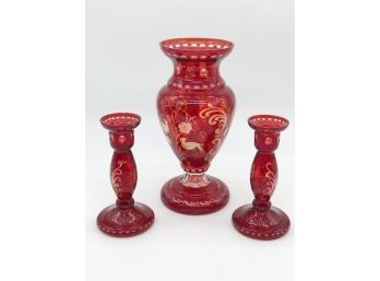 (106) ETCHED RUBY GLASS SET OF THREE - PAIR OF CANDLESTICKS & VASE - RED CUT TO CLEAR - 7-10' - BIRDS & SCROLL