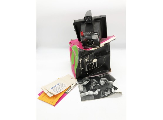 (2) VINTAGE POLAROID 'ZIP' LAND CAMERA - NEVER USED IN DAMAGED BOX - SEE PHOTOS