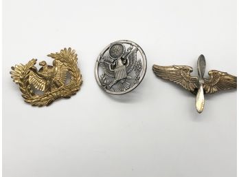 (57) LOT OF 3 ITEMS-WW11 MILITARY EAGLE CREST HAT PINS & STERLING USAAF CADET WING-US ARMY OFFICER CAP DEVICE-
