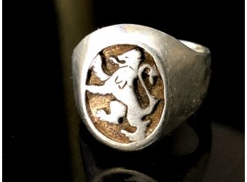 (105) STERLING SILVER RING W/LION INSIGNIA-NOT MARKED BUT ACID TESTED-SIZE 7 1/2-WGHT. 5.9 DWT