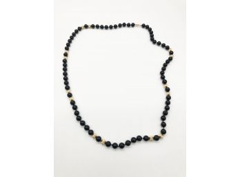 (J23) BLACK STONE W/GOLD COLORED BEADS & 14KT GOLD CLASP NECKLACE-APPROX.36' LONG