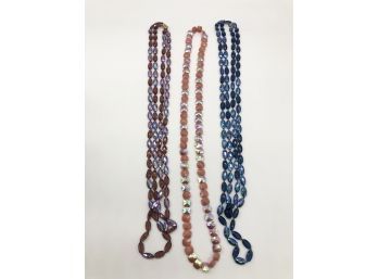 (j21) LOT OF 3 NECKLACES-BLUE CRYSTAL & PURPLE MEASURES 34' CLOSED-ROSE COLORED STONE NECKLACE 17'