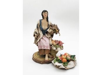 (21) VINTAGE HAND CRAFTED POTTERY FIGURINE OF WOMAN WITH OCTOPUS, STARFISH & BASKET OF FRUIT