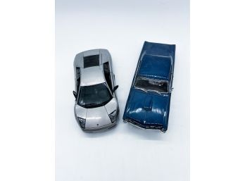 A-42- LOT OF TWO DIE CAST COLLECTOR CARS - MAISTO LAMBORGHINI & WELLY 1986 PONTIAC