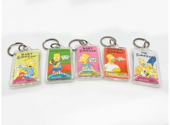 A-65- LOT OF FIVE VINTAGE 'THE SIMPSONS' PLASTIC KEYCHAINS - HOMER, BART, MARGE, LISA, MAGGIE