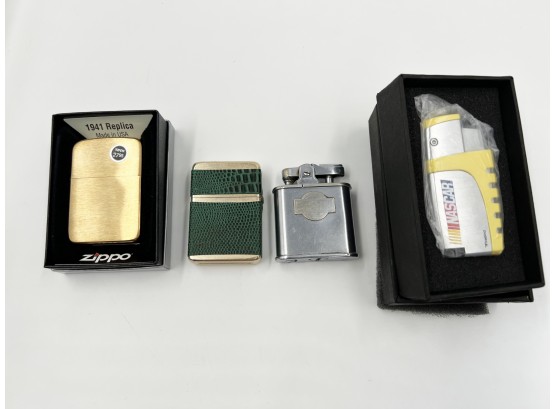 (67) LOT OF 4 LIGHTERS-ZIPPO 1941 REPLICA-FIREBIRD NASCAR-STORM KING W/LEATHER-RONSON WIRLWIND-ALL UNTESTED