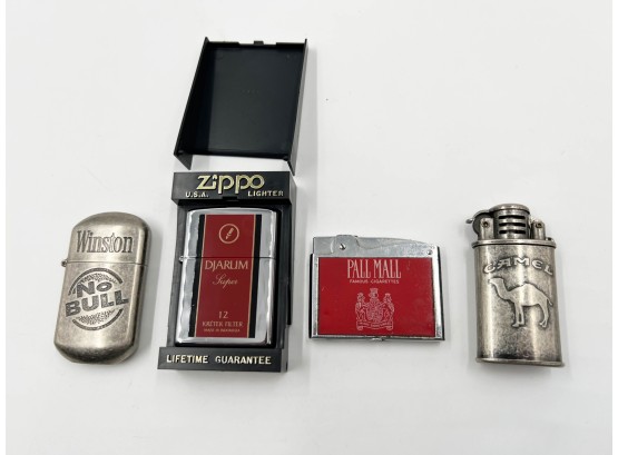 (105) LOT OF 4 CIGARETTE RELATED LIGHTERS-1997 ZIPPO, CONTINENTAL AND 2 UNNAMED-UNTESTED