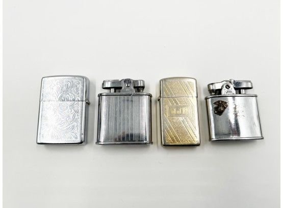 (1) LOT OF 4 VINTAGE LIGHTERS-2 ZIPPO AND 2 RONSON-1 RONSON WITH MARINE INSIGNIA-UNTESTED