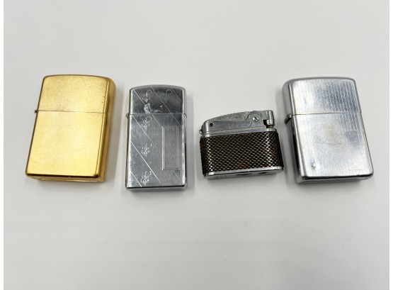 (14) LOT OF 4 VINTAGE LIGHTERS-3 ZIPPOS AND 1 OMEGA-UNTESTED