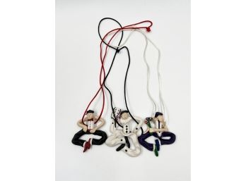 (5) LOT OF 3 ACRYLIC/RESIN NECKLACES-2 MALE DANCERS AND 1 CLOWN