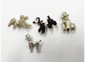 (J-97) LOT OF FOUR VINTAGE POOPLE BROOCHES - DOG JEWELRY