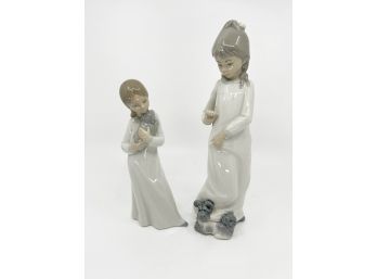 (L-24) TWO VINTAGE 'ZAPHIR' SPAIN PORCELAIN FIGURINES - LITTLE GIRLS WITH THEIR PUPPIES - 9'