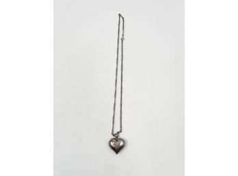 (lOT 10) STERLING SILVER HEART PENDENT WITH 14KT LITTLE HEART-APPROX. 6 DWT AND CHAIN
