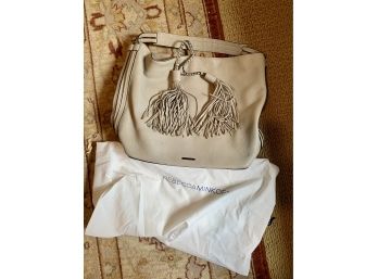 (B-46) GENTLY USED 'REBECCA MINKOFF' SAND COLORED LEATHER HANDBAG WITH TASSLES - 15' - 12' ACROSS