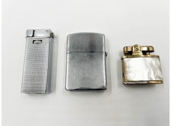 (LOT 42) LOT OF 3 LIGHTERS-MARHILL W/PEARL HANDLE-2 UNBRANDED-ALL UNTESTED