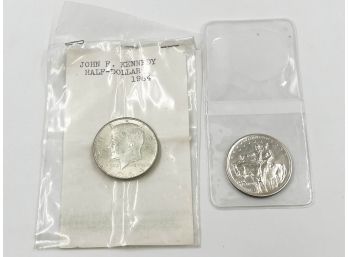 (LOT 87) LOT OF 2 SILVER COINS-1964 JFK HALF DOLLAR AND 1925 STONE MOUNTAIN HALF DOLLAR
