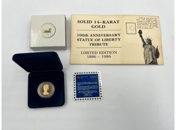 (LOT 100) LOT OF 2 COINS-14KT GOLD 100TH ANNIVERSARY 1986 & UNCIRCULATED 1987 CANADA DOLLAR