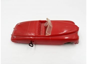 (lOT 12) VINTAGE SAUNDERS WIND-UP RED PLASTIC CONVERTIBLE PACKARD-COMPLETE AND WORKS