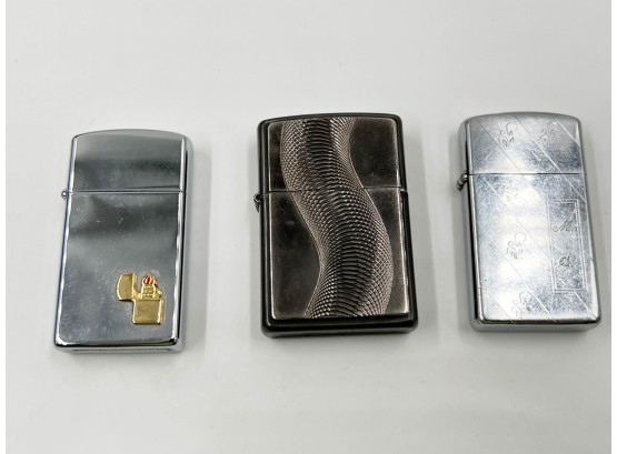 (LOT 15) LOT OF 3 VINTAGE 'ZIPPO' LIGHTERS-1994 W/LIGHTER INSIGNIA, 1999 TEXAS TWISTER, 1 ENGRAVED-ALL WORKIN