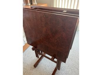 (DAY-B) SET OF FOUR TV SNACK TABLES ON STAND - FRONTGATE - BURLED WOOD FOLDING TRAY TABLES - $300 - 23' BY 19'