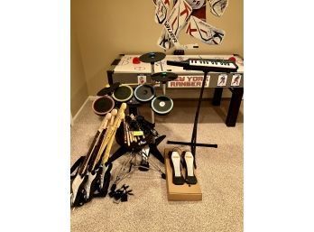 (RR) XBOX ROCK BAND MUSICAL LOT-FOUR FENDER GUITARS, DRUMS, STICKS, MIKES, PLAY STATION KEYBOARD & FOOT PEDAL