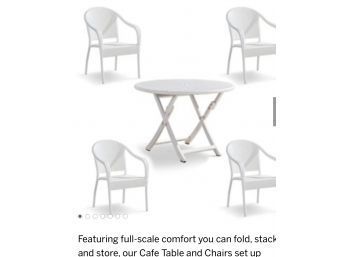 FOUR VINYL WICKER FRONTGATE CURVED BACK, STACKABLE CHAIRS WITH BLUE SEAT CUSHIONS & CAFE ROUND FOLDING TABLE