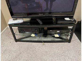 (LOT BA-68) THREE TIER TV AND STEREO STAND-GLASS AND METAL 48'X57'X16' (JUST STAND NO EQUIPMENT)