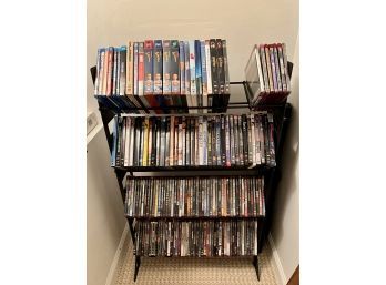 (PR APPROX. 130 DVD's - MOVIES & STAND -