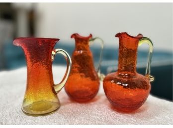 (LR-8) COLLECTION OF 3 VINTAGE MCM CRACKLE GLASS PITCHERS - RED & AMBERINA GLASS - 4'- 5' TALL