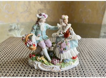(D-40) VINTAGE 'DRESDEN, GERMANY' PORCELAIN LACE GROUPING COUPLE SITTING WITH FLOWERS - 6' BY 5.5'