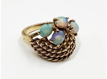 (J-2) VINTAGE 14KT GOLD WOMAN'S COCKTAIL RING WITH 4 OPALS  - SIZE 5 1/2 WGHT  - 3.69 DWT