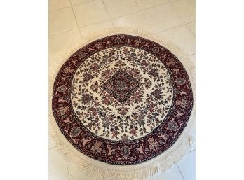TRADITIONAL STYLE ROUND AREA RUG IN SHADES OF RED - MACHINE MADE, APPROX 5' ACROSS