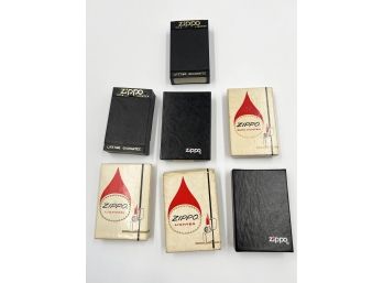 (J-38) LOT OF 7 EMPTY VINTAGE 'ZIPPO' CASES AND BOXES-NO LIGHTERS